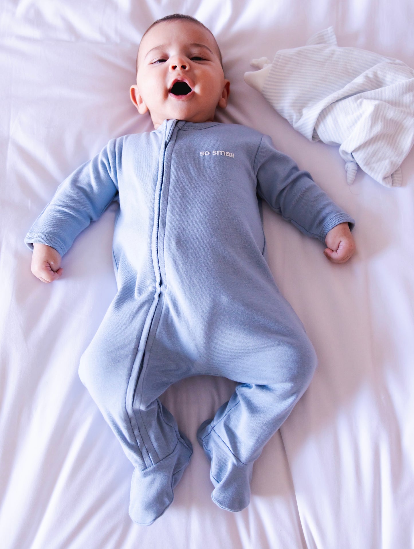 so small Organic Zipper Footie- Sky Ride