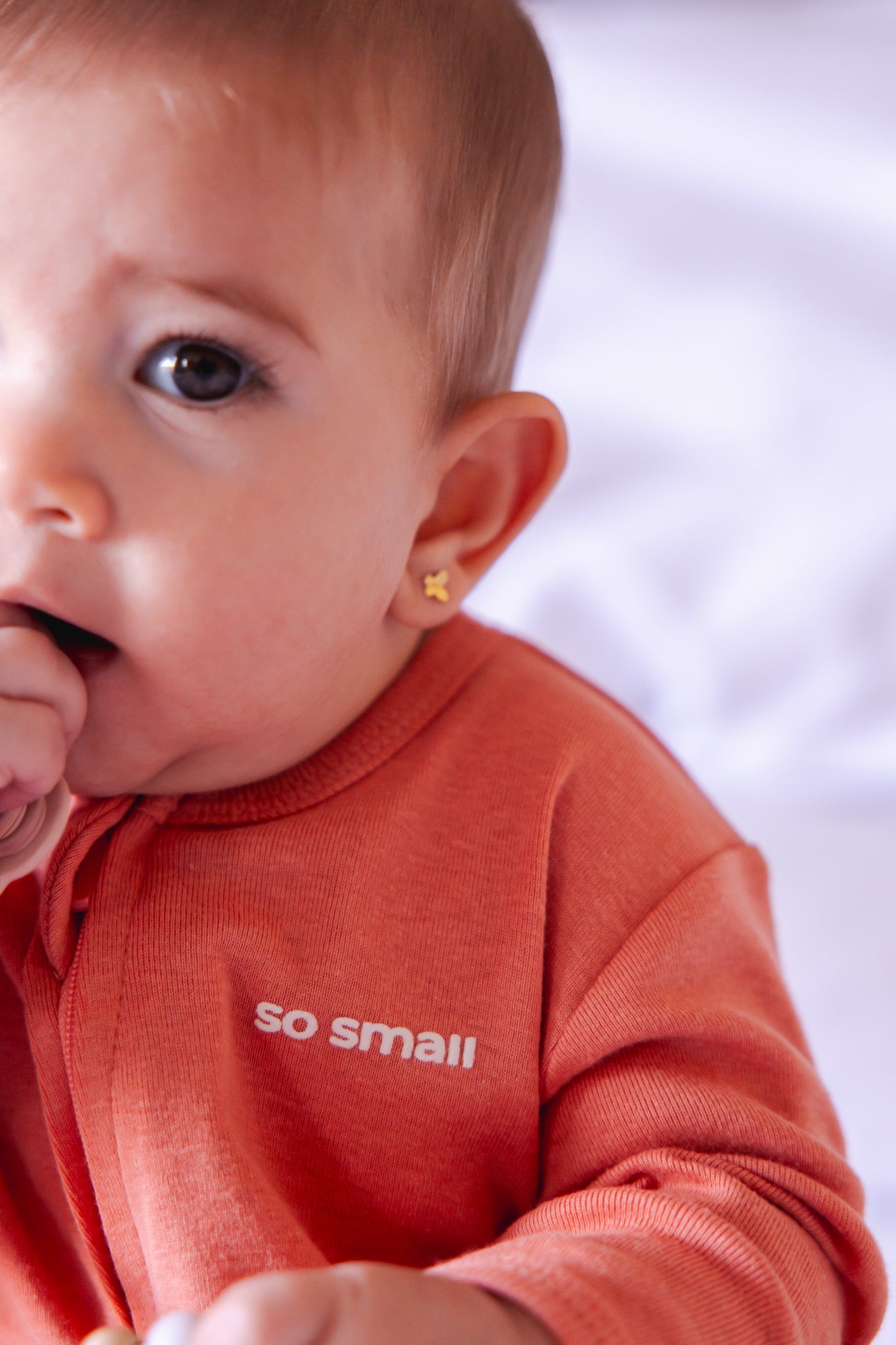 so small Organic Zipper Footie- Peach & Cream
