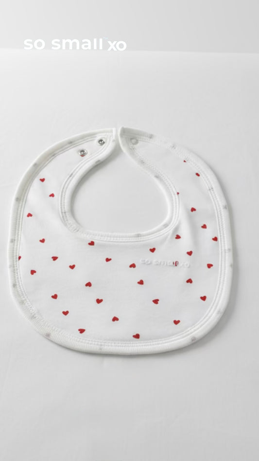 so small xo Terry-Lined Bib- Tiny Hearts
