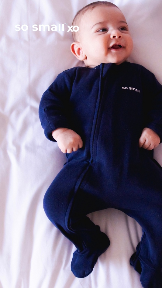 so small xo Zipper Footie- Magnetic Blue